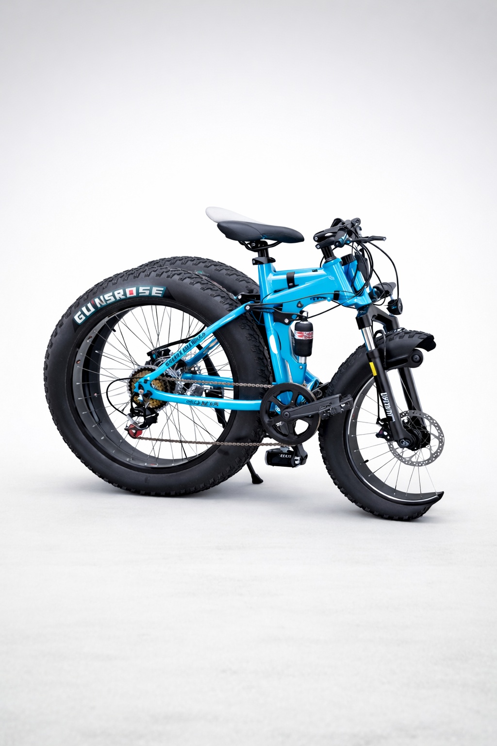 Size 26 mountain fat bike with extra-wide tires, durable frame, multi-speed gears, powerful braking system, and rugged design, built for riding on sand, gravel,