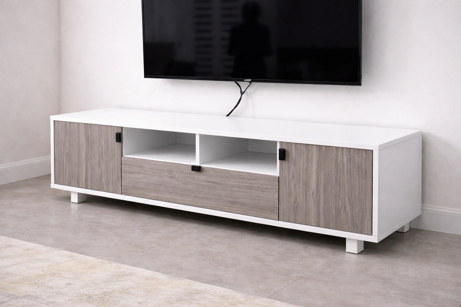 Modern white and oak TV stand with side storage cabinets, central drawer, and open media shelves.
