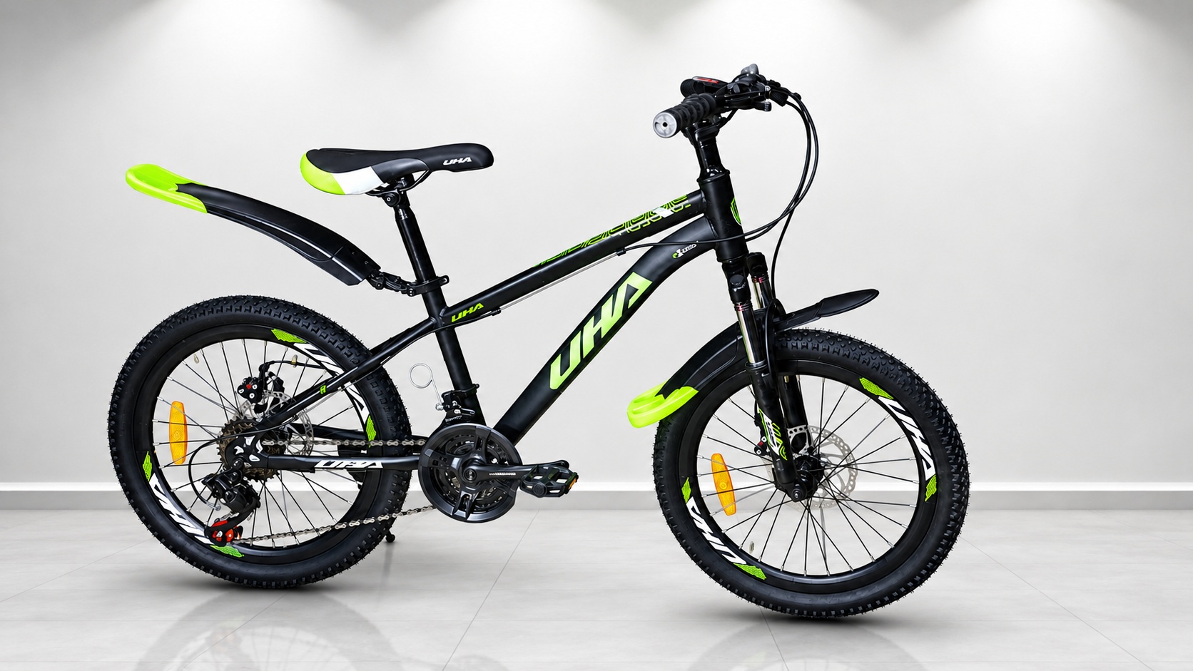 Size 20 UHA mountain bike with a black and red frame, front suspension fork, 21-speed gearing, disc brakes, all-terrain tires, and mudguards, designed for young
