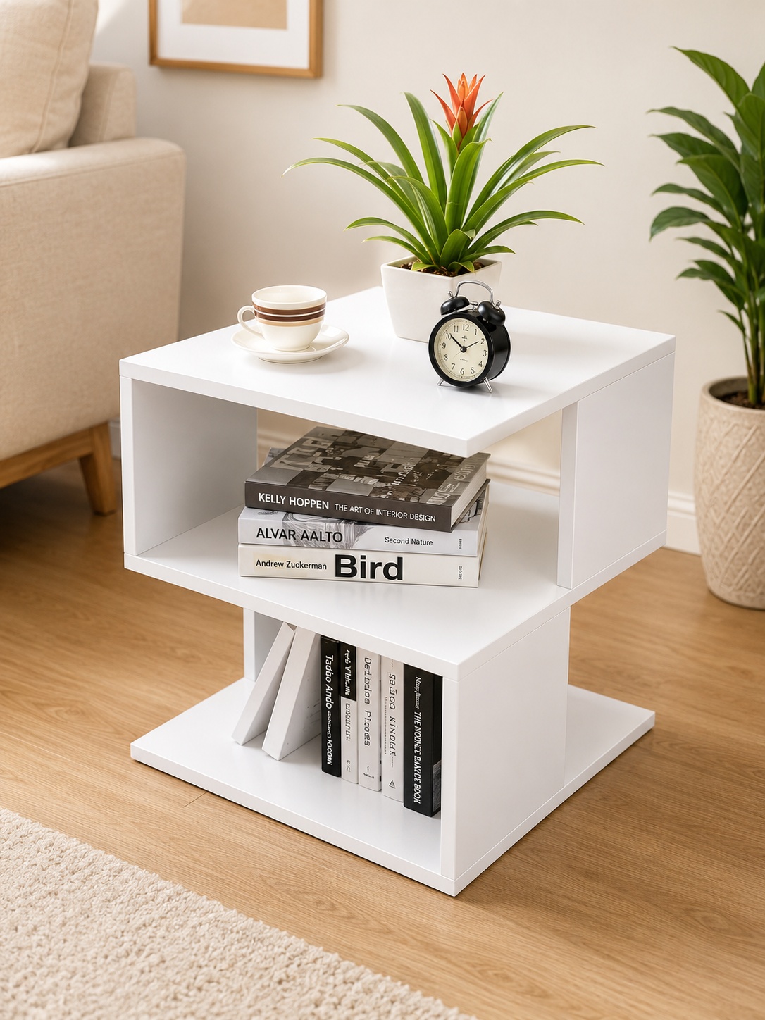 Modern white side table with open bookshelf storage shelves, suitable for living rooms, bedrooms, and office spaces.