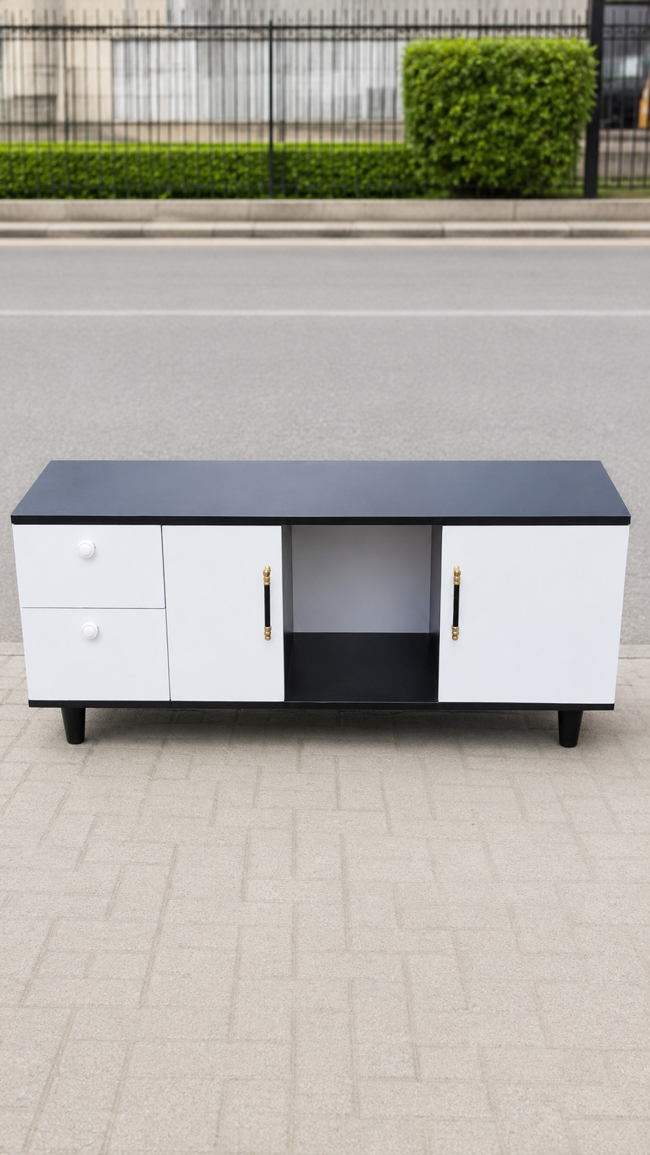 4ft executive storage cabinet in black and white finish featuring two drawers, two side-door compartments, and an open center shelf with gold-accented handles,