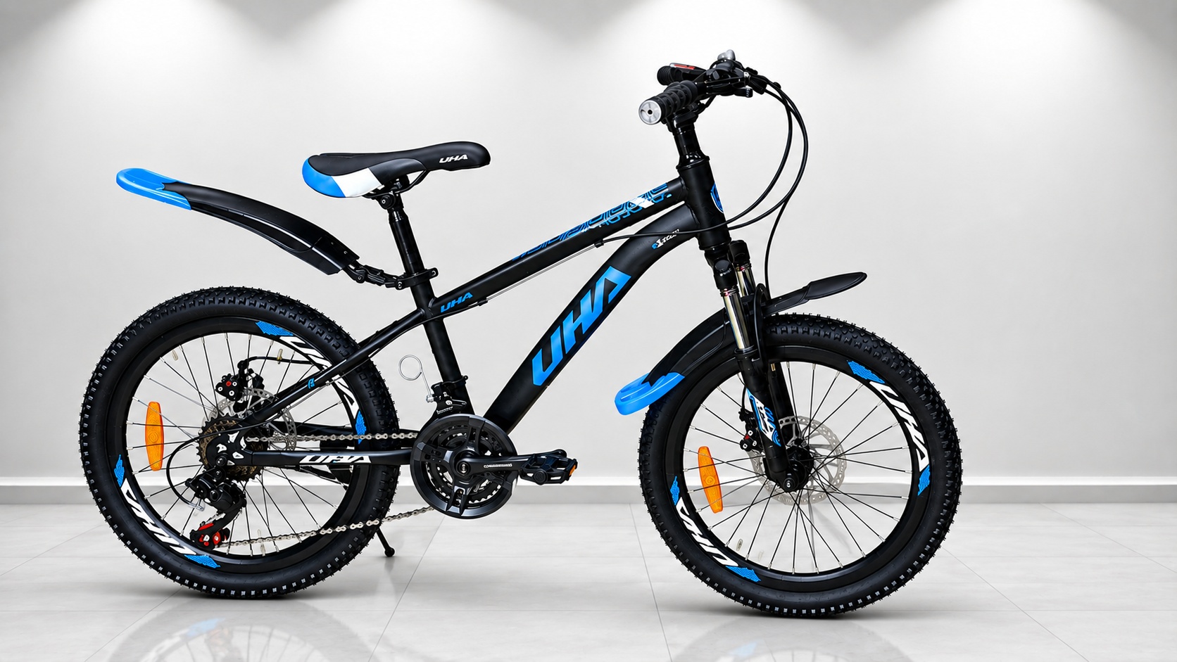 Size 20 UHA mountain bike with a black and red frame, front suspension fork, 21-speed gearing, disc brakes, all-terrain tires, and mudguards, designed for young