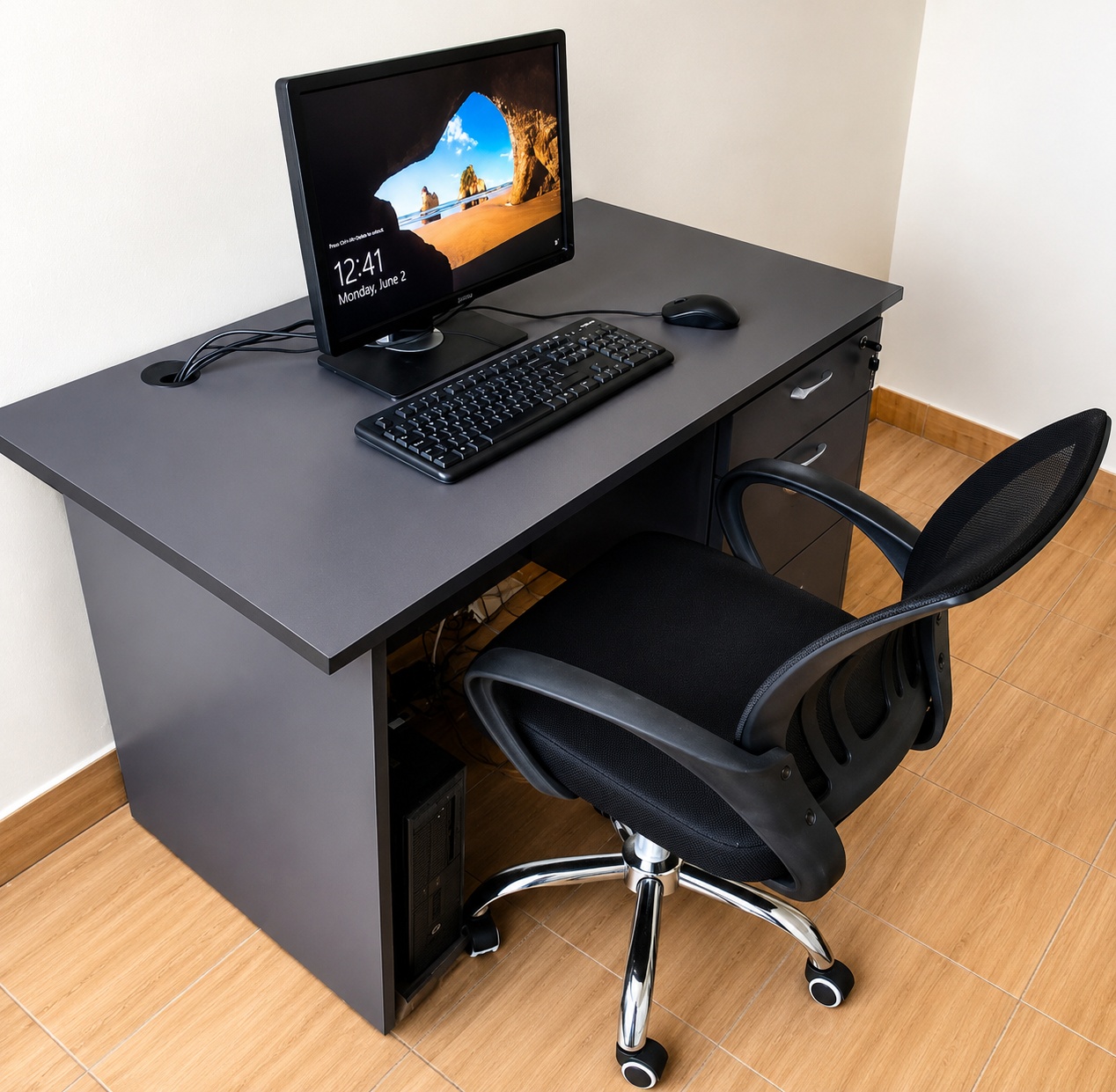 1.0 metre grey office computer desk with three storage drawers, cable management grommet, and CPU compartment.
