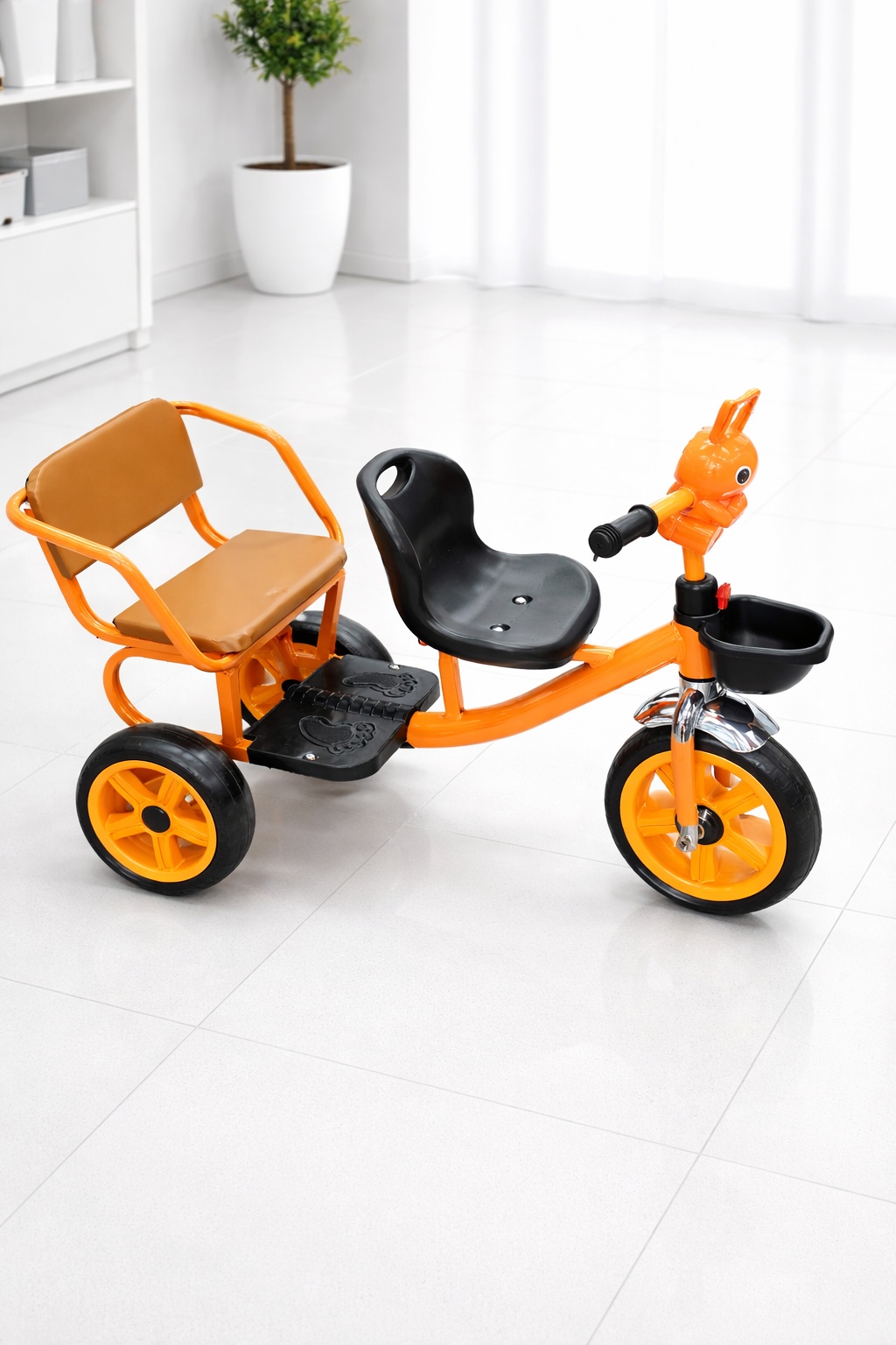 Children's tricycle with rear passenger seat, front storage basket, and stable three-wheel design.