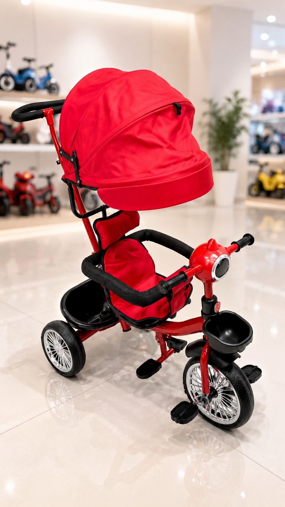 Children's tricycle with a protective canopy, parent push handle, safety guard rail, footrests, storage baskets, and three-wheel design.